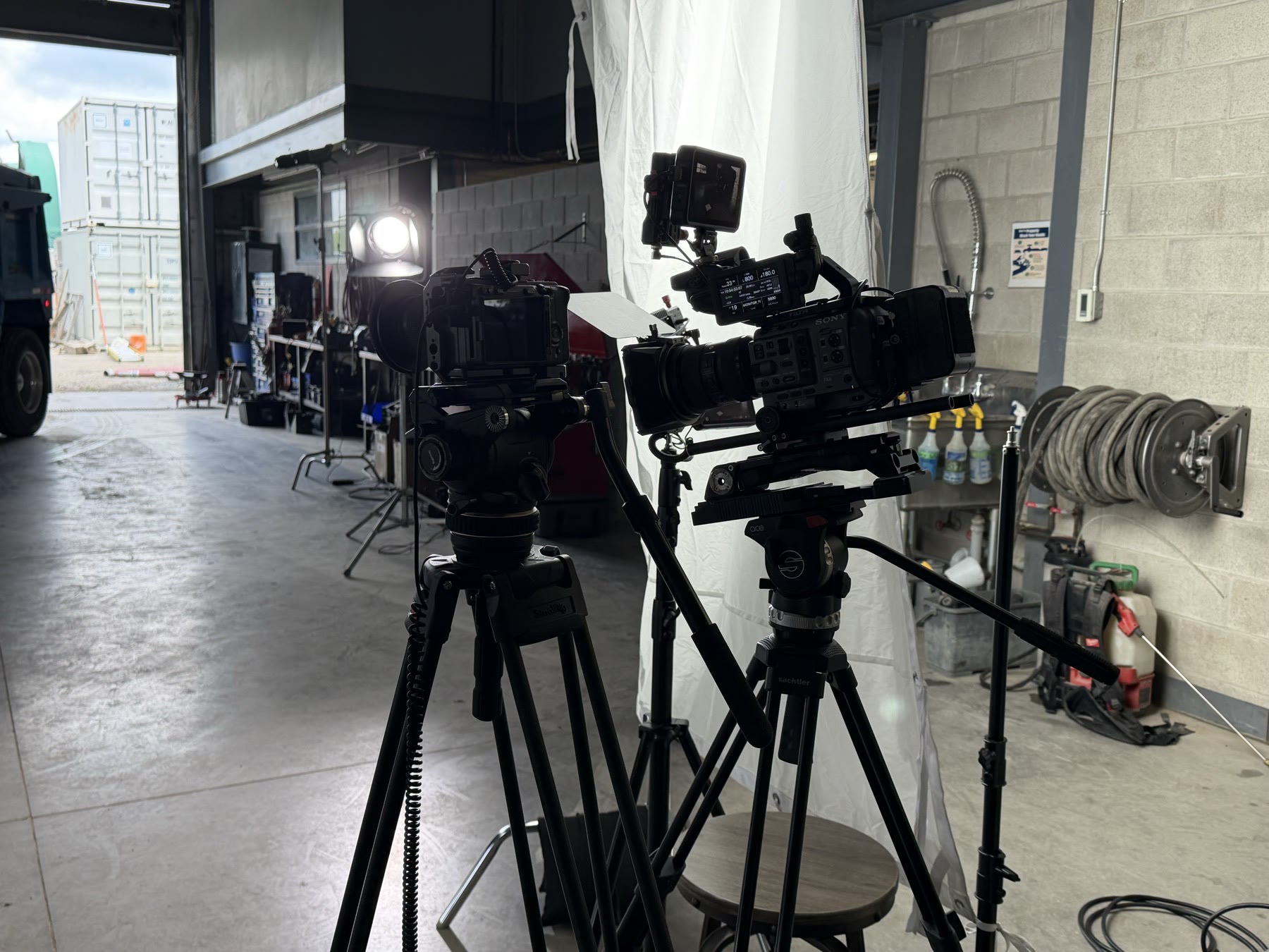 Cameras and lighting prepared for a BYNIC video production